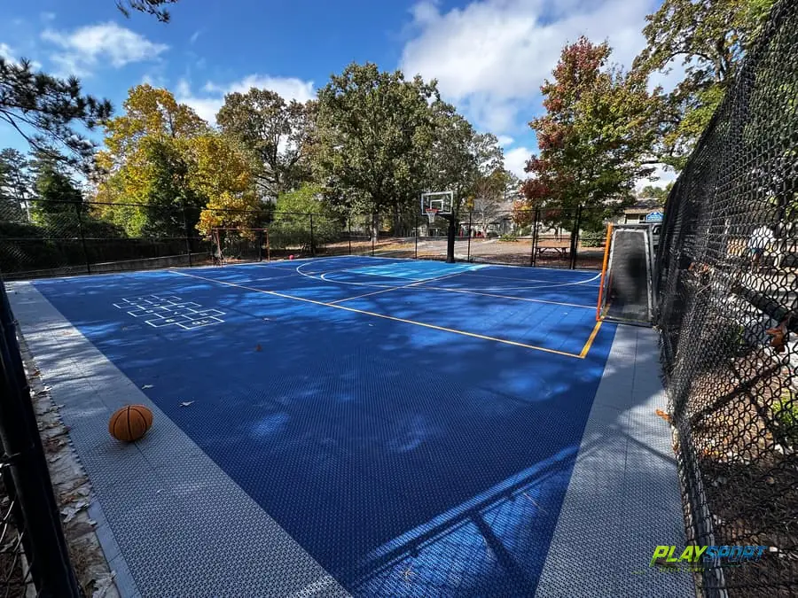 Close-up of a PlaySport modular hockey court tile surface