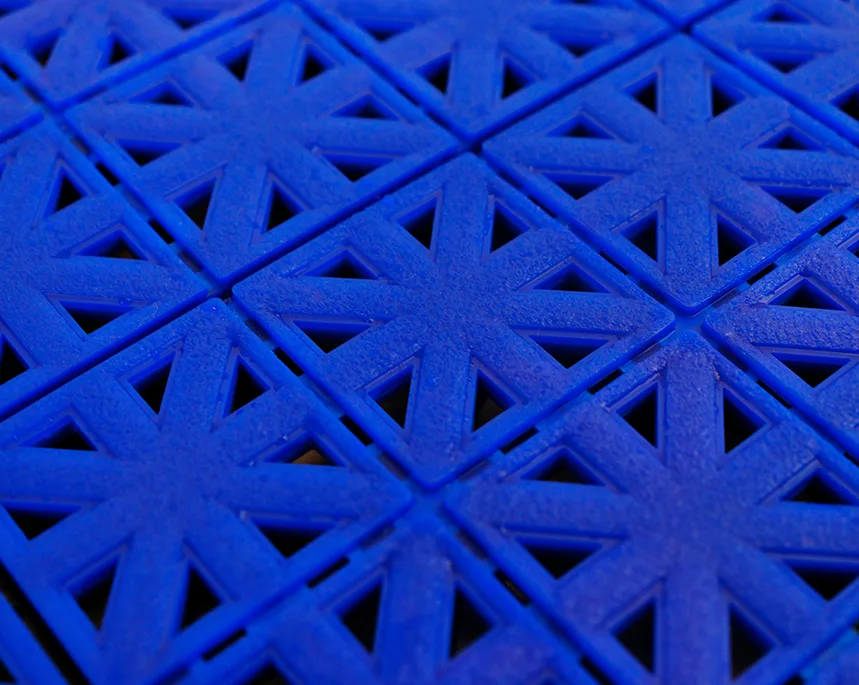 X COURT surface macro — elite traction X-pattern