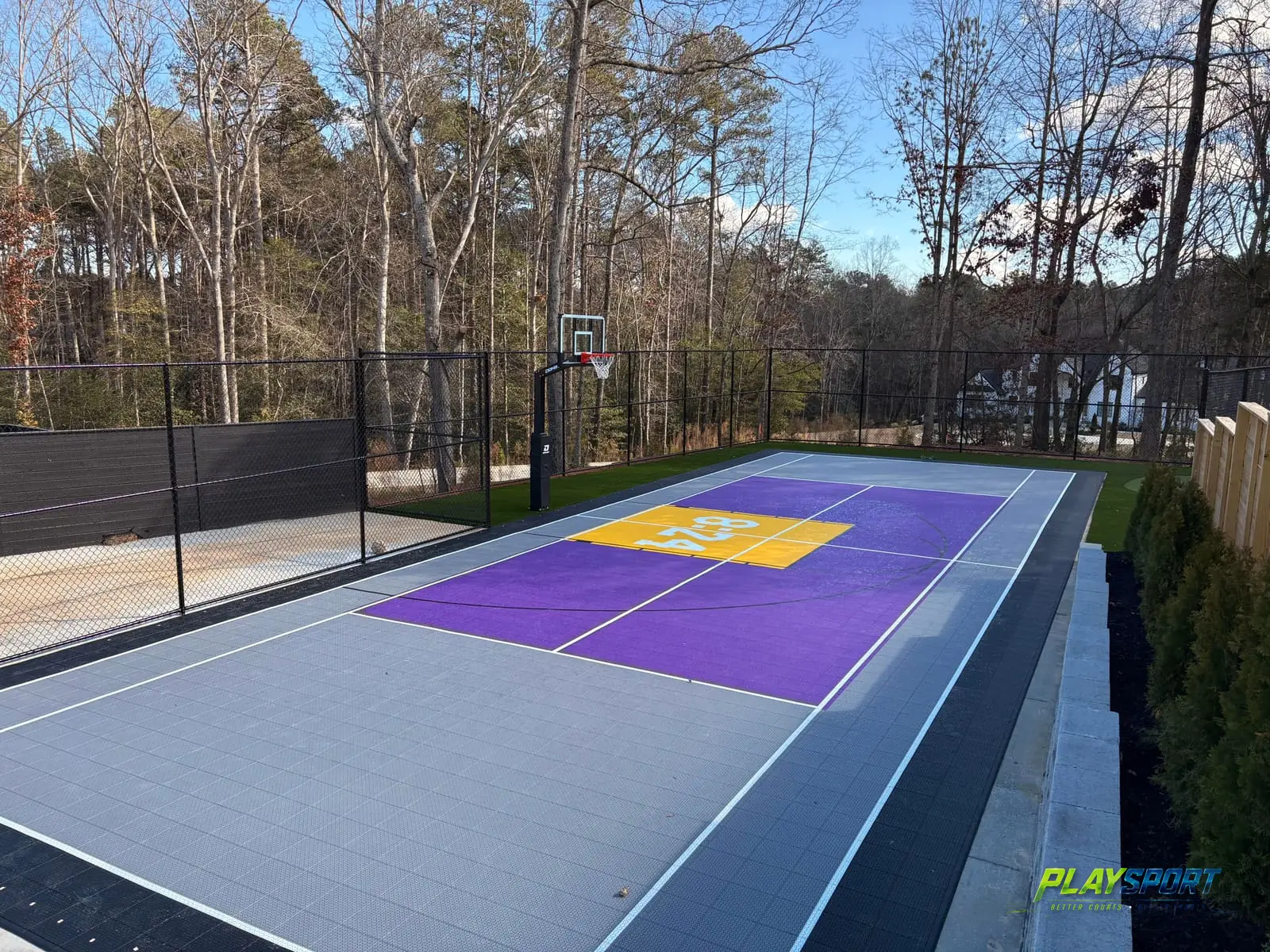 PlaySport TRUE tile modular pickleball and tennis court system installed outdoors